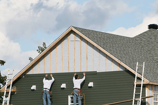 Professional Siding technician working in Ashville, PA